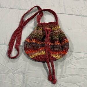 The Sak small crocheted purse/satchel or hobo bag.
